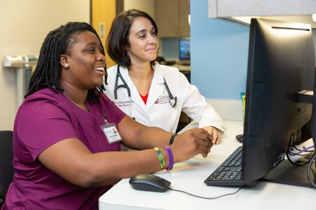 gonzaba hospice nurse and physician reviewing patient files gonzaba hospice nurse and physician reviewing patient files