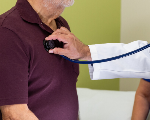 hospice physician checking heart rate