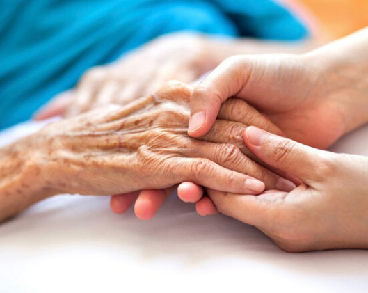 caregiver nurturing hospice patient